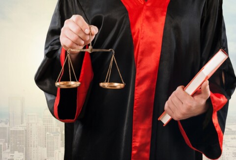 Close-up  judge with scale at courtroom