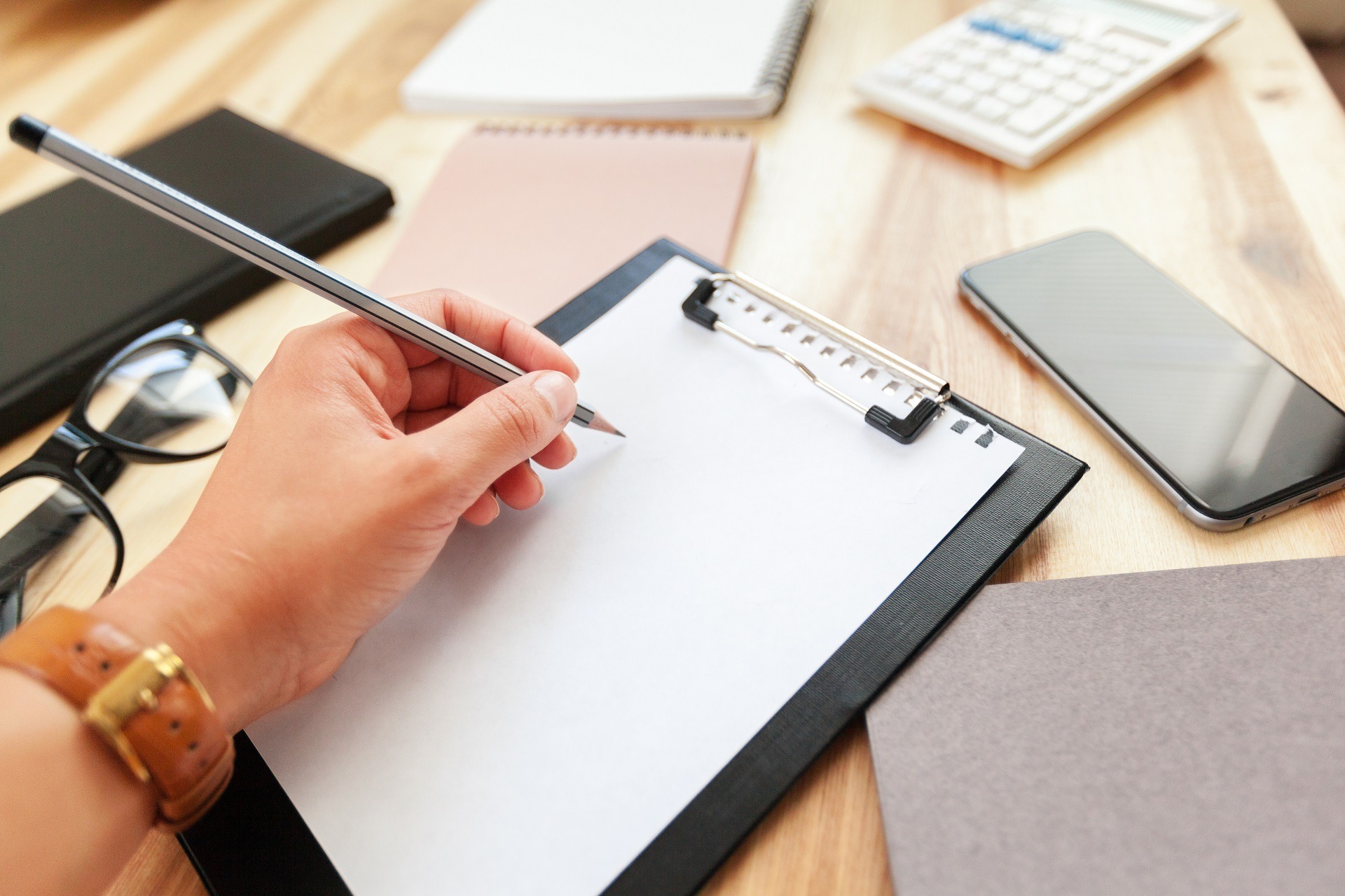 Hands of business woman signing the contract document